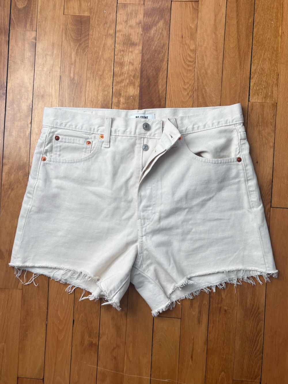 Re/Done Off-White Frayed Hem Denim Cutoff Shorts